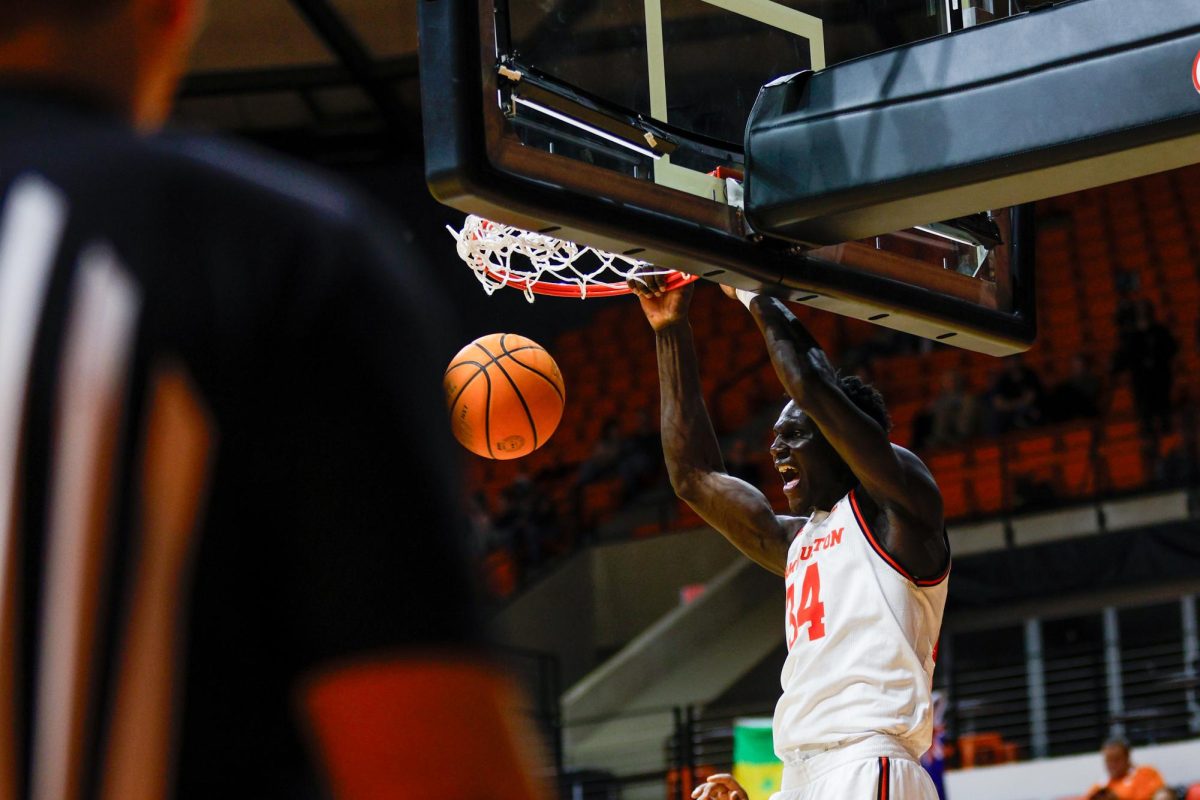 Sam Houston forward Kalifa Sakho throws down a dunk during Thursday's win over Jacksonville State at Johnson Coliseum.