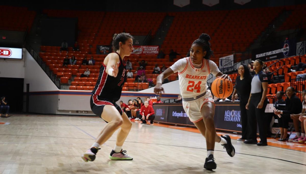Senior guard Whitney Dunn drives the lane during Sam Houston's Thursday night victory over Jacksonville State. Dunn recorded five points in the Bearkats' win.